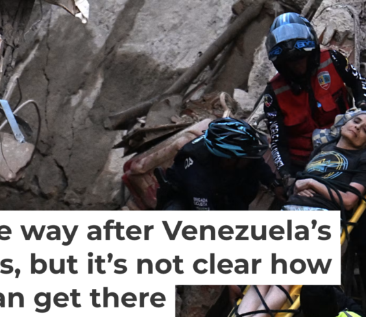 Rescue workers carry a person on a stretcher in Caracas following an earthquake in Venezuela on June 24, 2026. Juan Barreto/AFP via Getty Images